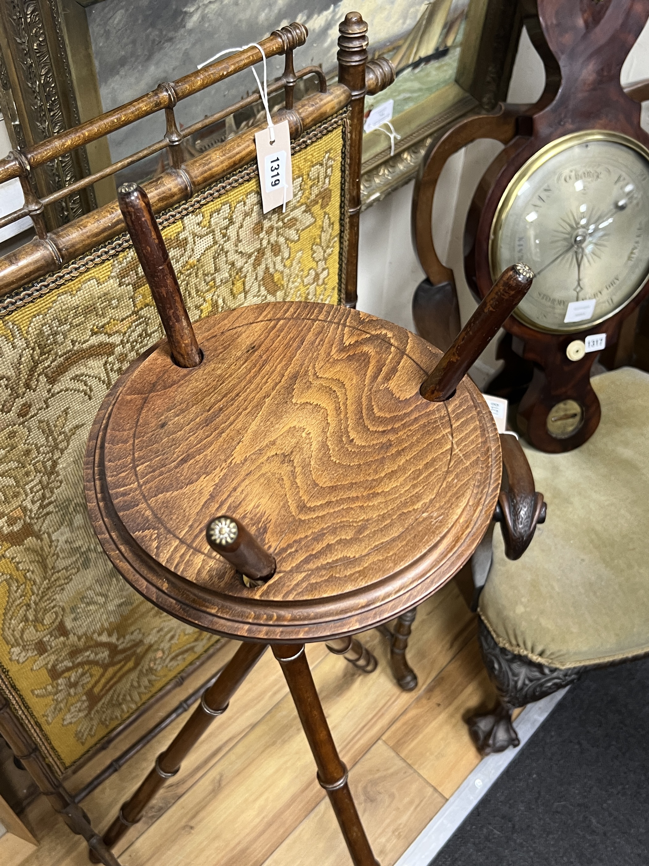 A Victorian faux bamboo firescreen and folding tripod plant stand, width 64cm, height 106cm